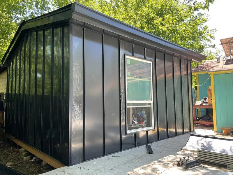 Black standing seam metal wall panels for Metal Roof Installation in Inverness Highlands South