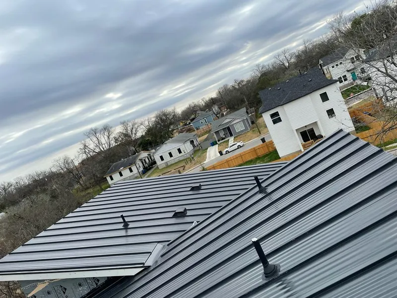Standing seam metal roof panels with vents for Skylight Repair in Inverness Highlands South